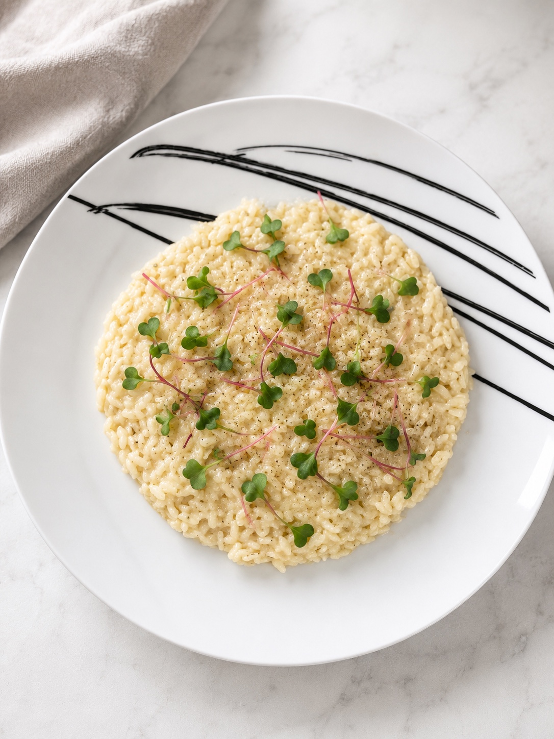 Gorgonzola risotto topped with Ravanello Rosso microgreens